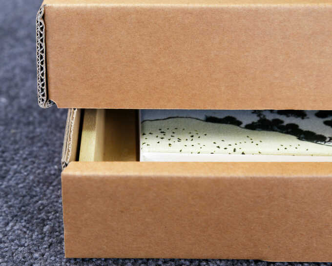 détails boîte double cannelure